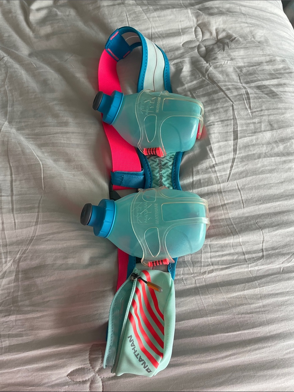 Nathan Women’s Hydration Belt with Dual Blue Bottles and Pink Strap